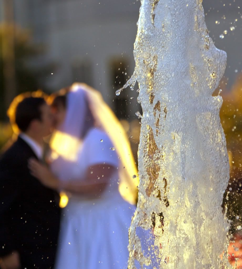 IMAGE: http://i1103.photobucket.com/albums/g463/Roc34ky/Goodheart%20Wedding%20October%202011/WaterFountainKiss.jpg
