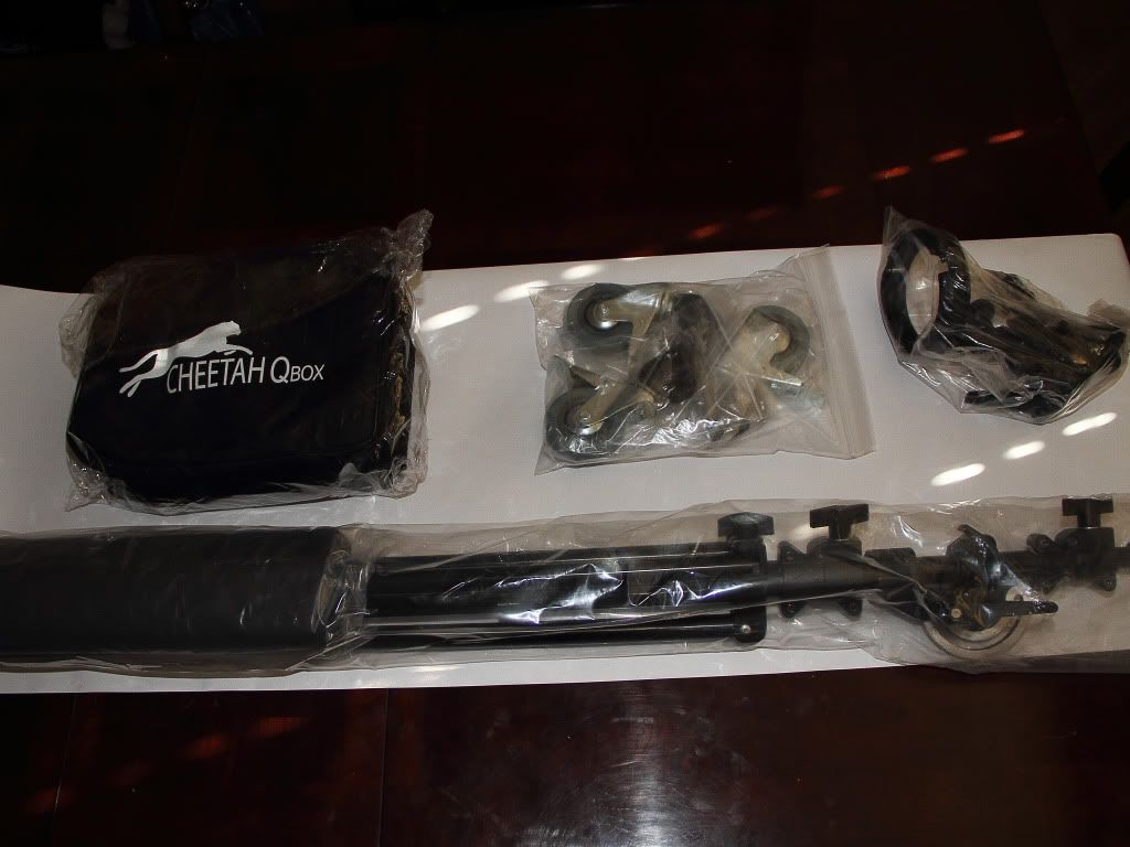 IMAGE: http://i1103.photobucket.com/albums/g463/Roc34ky/Openingthepackage.jpg